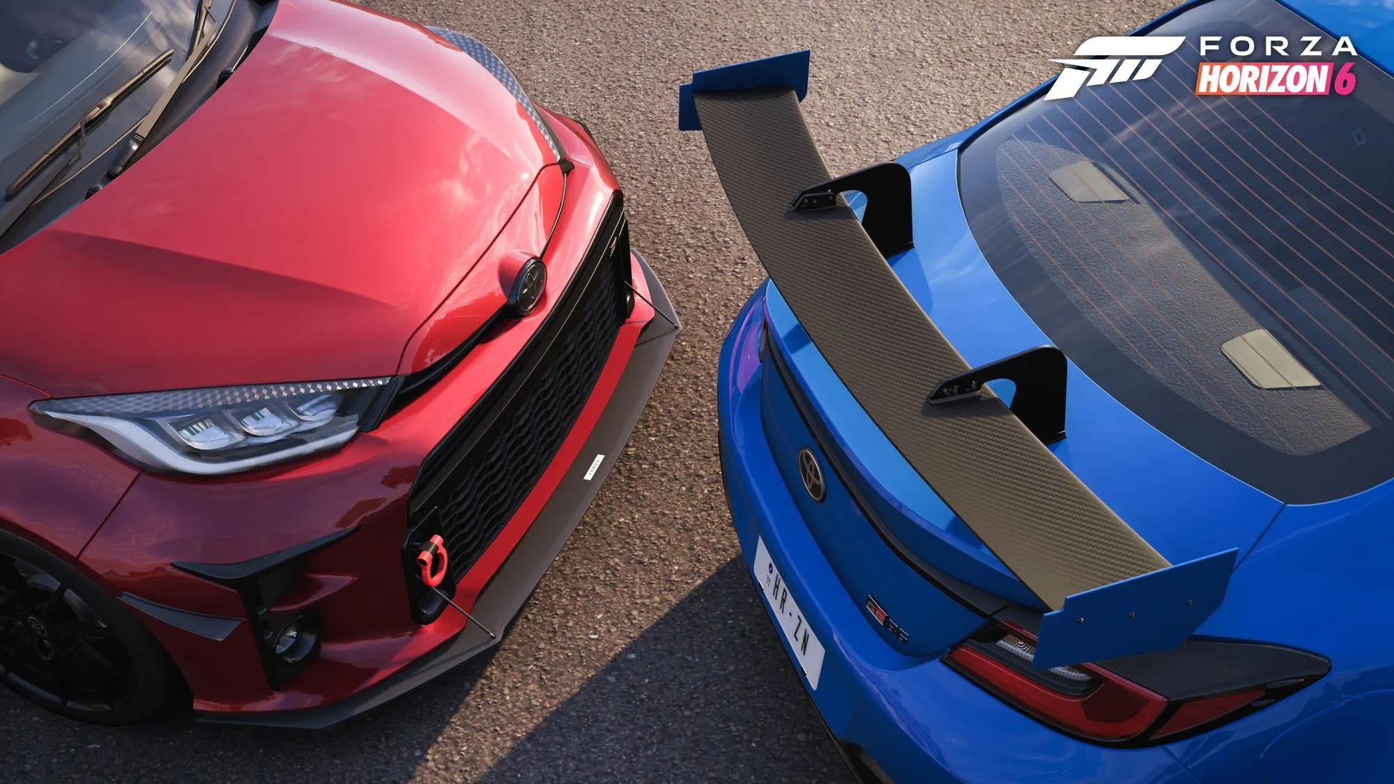 A customized garage space in Forza Horizon 6 with four cars on display